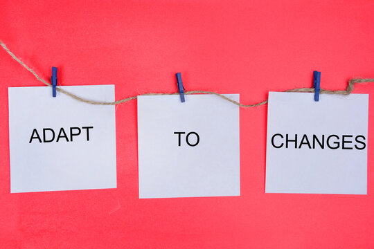 Adapt to changes words on paper note