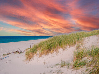 Fototapeta na wymiar sunset over the north sea with dunes