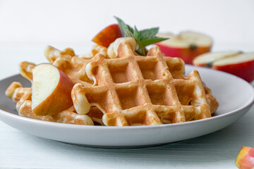 Waffles with apples on a plate
