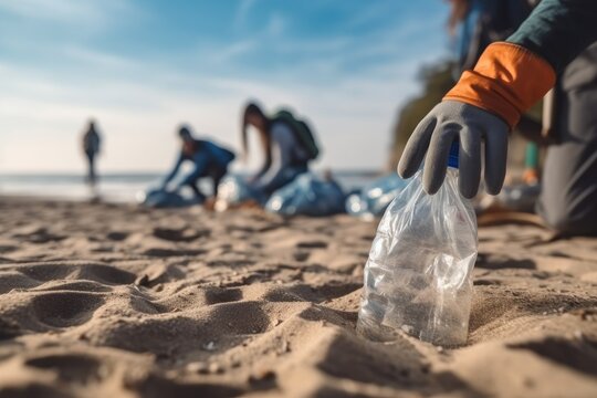 Woman volunteer collects garbage on the beach, Save earth concept, Environmental pollution.