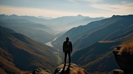 Hiker on top of a mountain, Mountaineering sport lifestyle concept, Success and goal achievement.