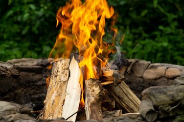 Fire burning in the fireplace in the nature or in the grill. Slovakia