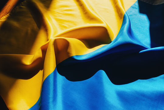 Flag Of Ukraine. National Yellow And Blue Flag With Harsh Shadows