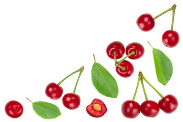 Some cherries with leaf closeup isolated on white background. Top view with copy space for your text. Flat lay.