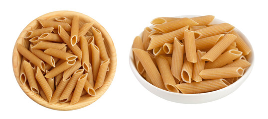 Wolegrain penne pasta from durum wheat in wooden bowl isolated on white background with full depth of field. Top view. Flat lay,