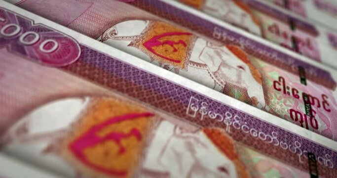 Myanmar money Burma Kyat banknote loop. MMK money texture. Concept of economy, business, crisis, banking, recession, debt and finance. Moving over note. Loopable seamless 3d animation.