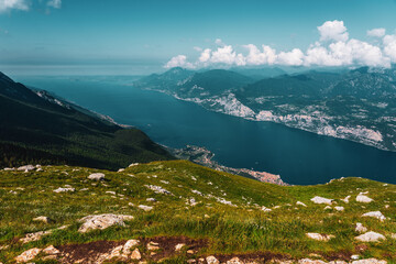 Fototapeta na wymiar Panoramic view from Monte Baldo on the old town of Malcesine and Lake Garda in Italy.