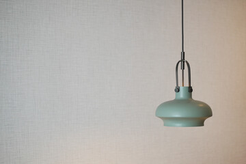  gray ceiling lamp hanging in a room ,