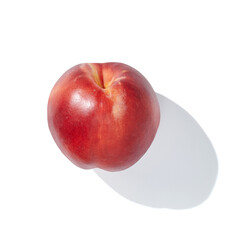single nectarine on white background