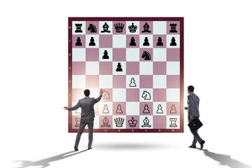 Business people playing chess on the board