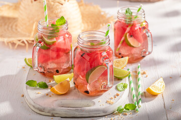 Cold lemonade with watermelon and mint leaves.