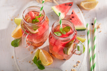 Healthy lemonade with melon, citrus and crushed ice.