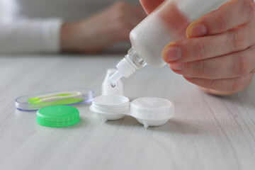 Contact lenses for vision correction in hands 