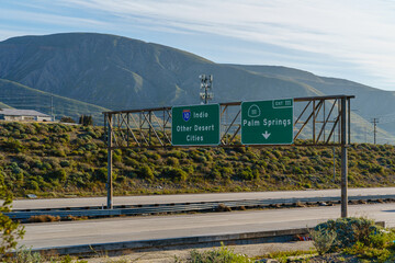 Freeway signs on Interstate 10 I-10 for Other Desert Cities, Indio, and 111 Palm Springs, California