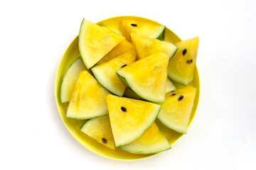 Yellow watermelon slices on white background.