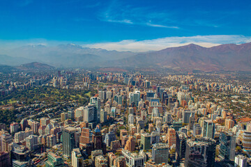 Naklejka premium streets of Chile, Santiago landscape with its buildings and the Andes mountain range