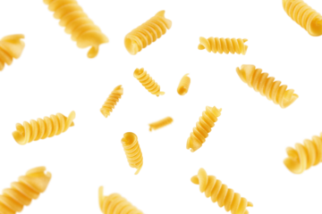 Falling raw Fusilli, Rotini, uncooked Italian Pasta, isolated on white background, selective focus