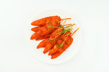 Chicken fillet inner skewers.Food concept.Fresh raw marinated chicken meat skewers iner fillet on a white background.Top view.Copy space.Food for retail.Ogranic food,healthy eating.