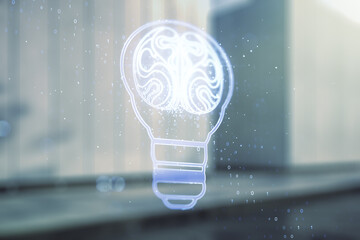 Abstract virtual idea concept with light bulb and human brain illustration on blurry modern office building background. Neural networks and machine learning concept. Multiexposure