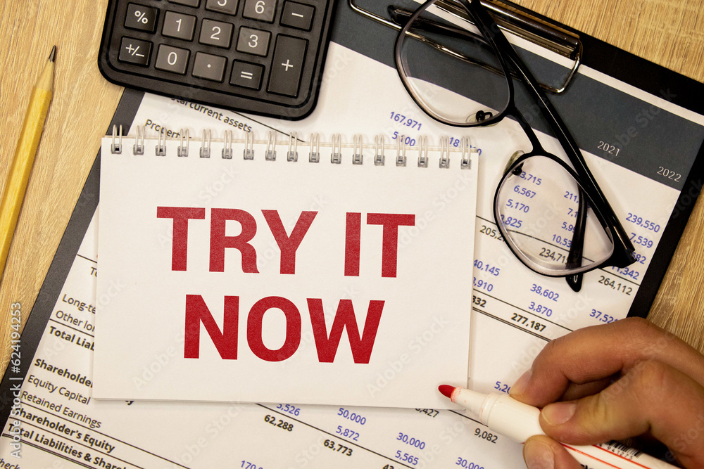 Poster try it now text write on paper, concept.