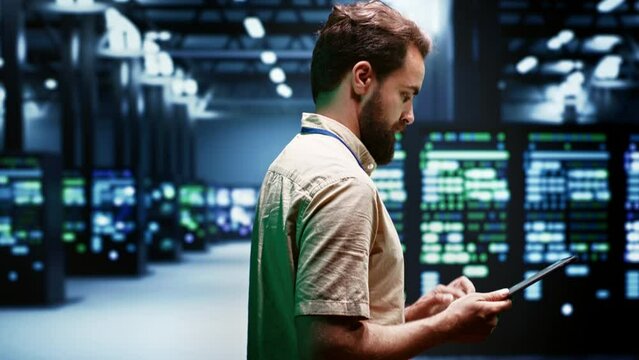 Engineer in data center using renewable solar and wind energy sources to power crypto mining operations. Expert working with eco friendly server clusters preventing significant environmental impact