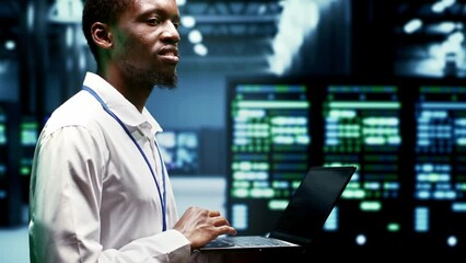 Technician inspecting cryptocurrency mining server clusters solving complex mathematical equations. Specialist in high tech facility housing blockchain technology high volume real time transactions - Powered by Adobe