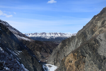 Fototapeta na wymiar Aerial view of a rugged mountain pass in the Alaska Range.