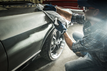 Classic Cars Owner Cleaning His American Muscle Cars