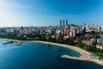 Fototapeta premium Aerial view of beach and park in Caddebostan district on the Marmara Sea coast of the Asian side of Istanbul Turkey.
