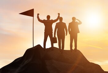 Businessmen in achievement and teamwork concept