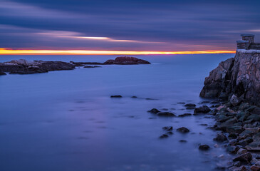 Fototapeta na wymiar Sunset at Cliff Walk, Rhode Island, long exposure shot
