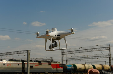 Civil geodetic quadrocopter makes topographic survey on a railway station