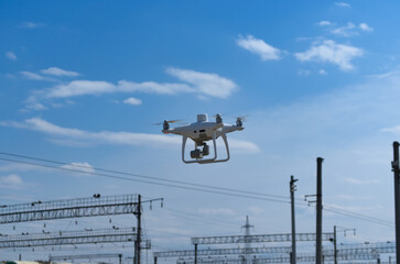 Civil geodetic quadrocopter makes topographic survey on a railway station