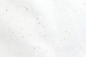 Luxury white Japanese paper studded with gold leaf.