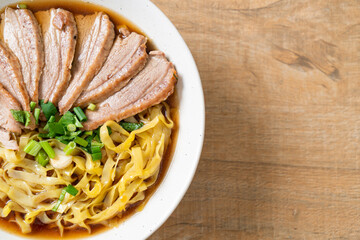 egg noodles with stewed duck in brown soup