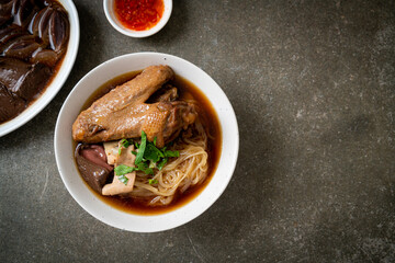 Braised duck noodles with brown soup