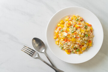 fried rice with mixed vegetable (carrot, green bean peas, corn) and egg