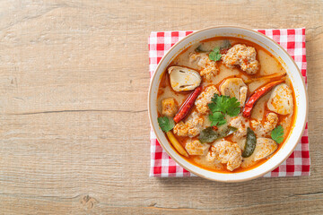spicy boiled pork soup with mushroom - Tom Yum