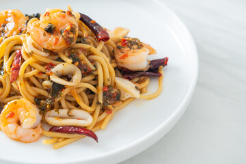 spicy spaghetti seafood on plate