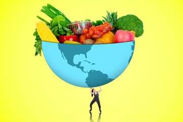 Tiny asian woman lifting a huge bowl of healthy foods isolated over yellow background