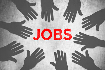 Silhouette of hands with letters JOBS