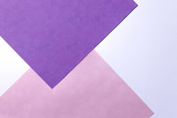 Geometric purple colors block background in soft pastel trend colors, made from watercolor paper