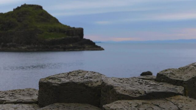 Sleepy paradise. Dusk over a calm North Atlantic Ocean bay and Irish coast.