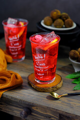 red soda syrup with lychee fruit