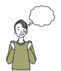 何かに怯えるシニア女性　