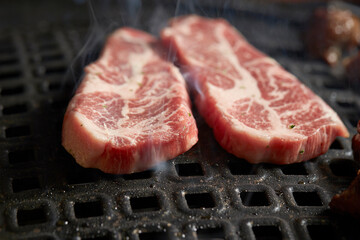 Grilled Pork Shoulder on the grill 