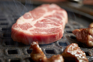 Grilled Pork Shoulder on the grill	