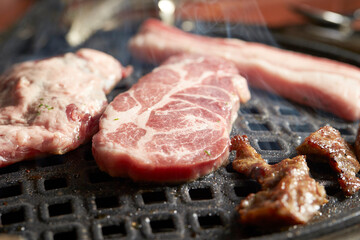 Grilled Pork Shoulder on the grill	