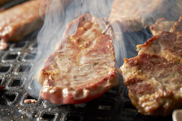Grilled Pork Shoulder on the grill	