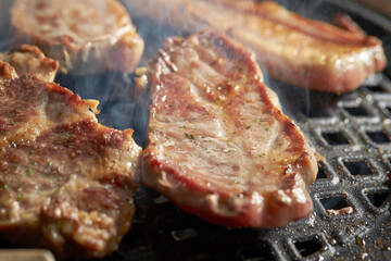 Grilled Pork Shoulder on the grill	